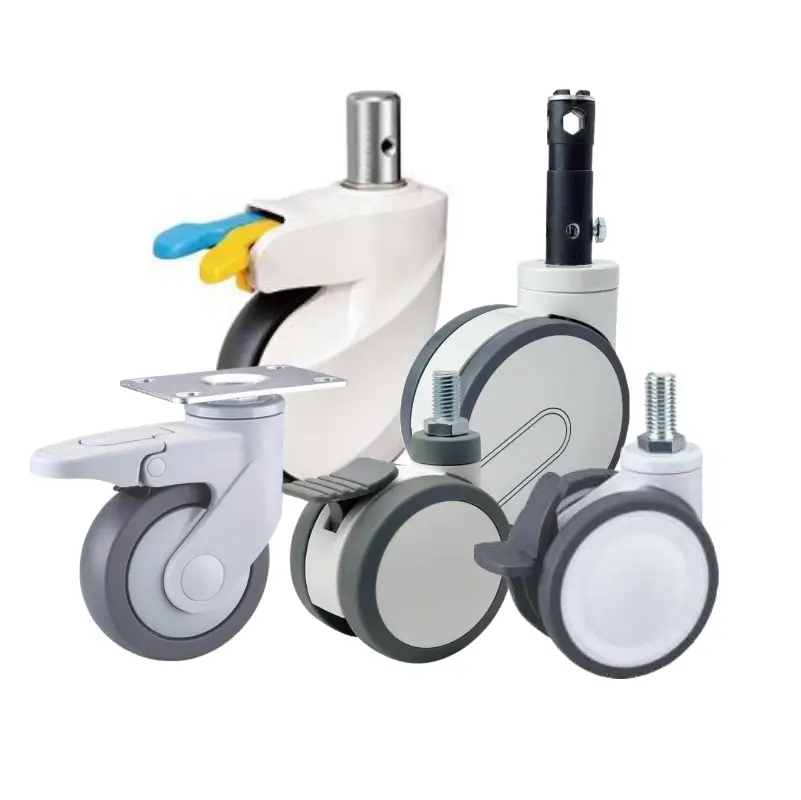 Group of modern medical casters in various styles and mounting types, including central locking mechnism stem, threaded stem, and plate mounts, featuring non-marking wheels, hygienic housings, and integrated brake pedals for hospital and lab equipment.