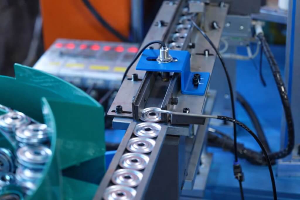 automatic caster parts assembly machine