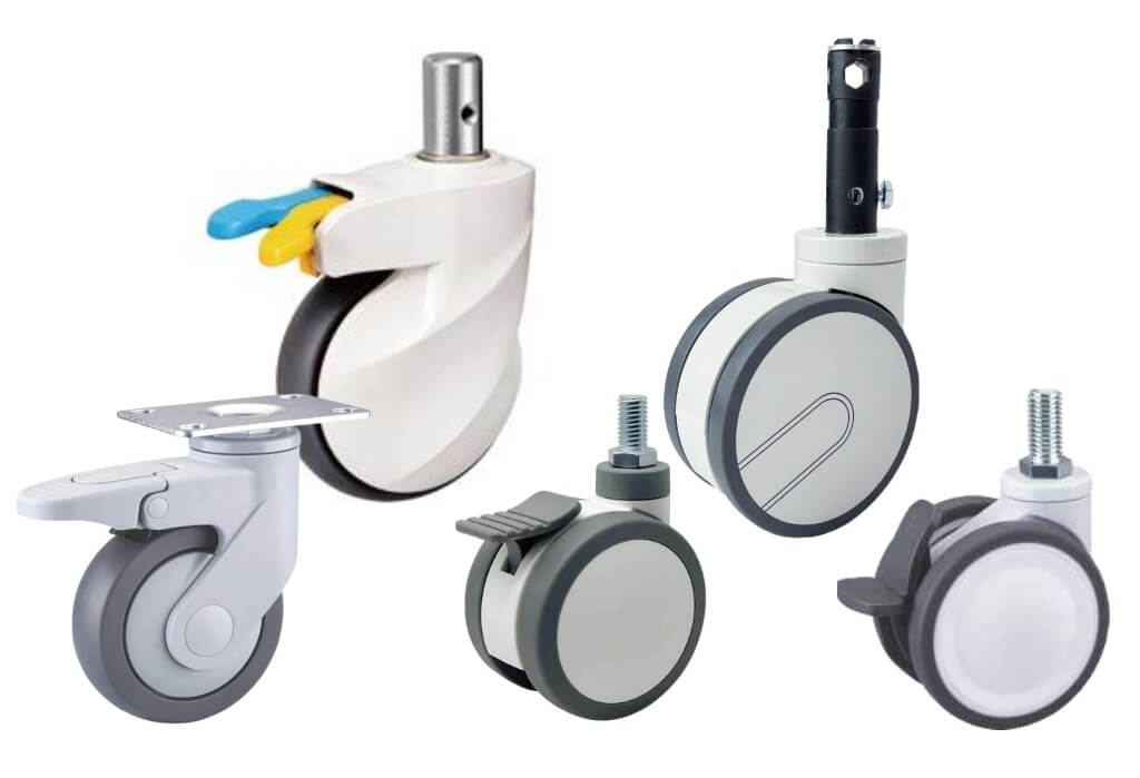 Group of modern medical casters in various styles and mounting types, including central locking mechnism stem, threaded stem, and plate mounts, featuring non-marking wheels, hygienic housings, and integrated brake pedals for hospital and lab equipment.