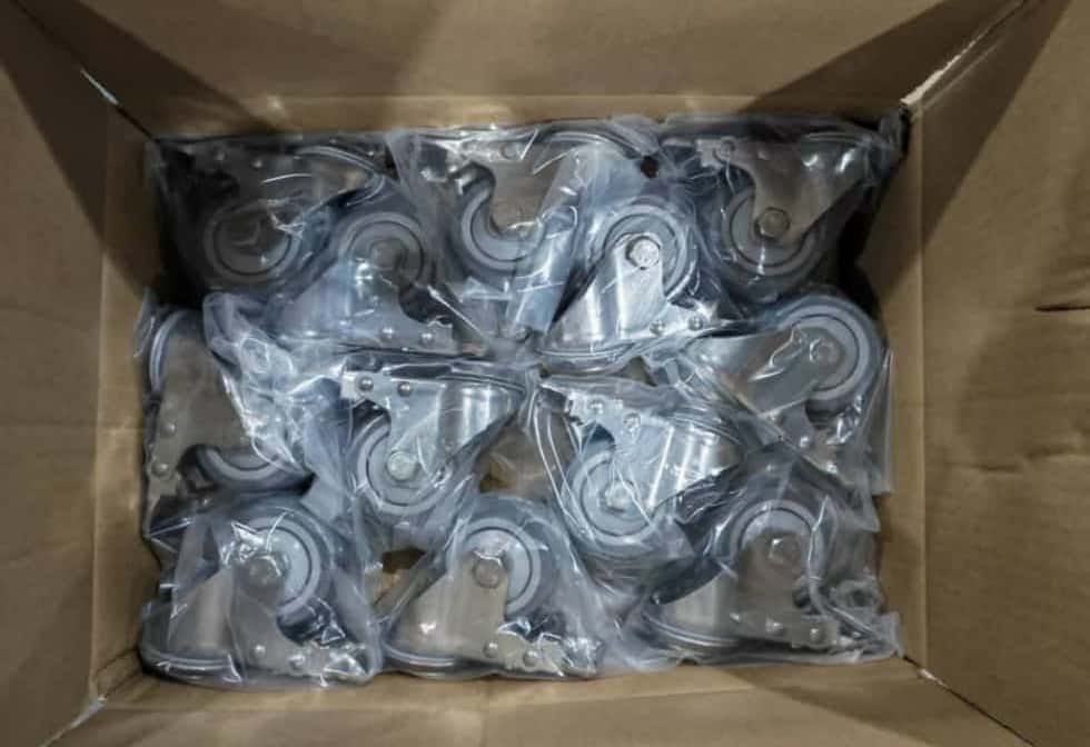 a photo of stainless steel casters in a carton box